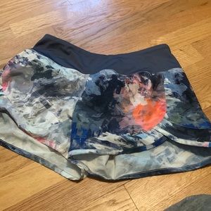 Multi colored running shorts. Size small.